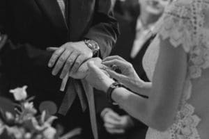 B&W Image of Wedding ring exchange