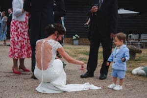 Bride pointing at the floor