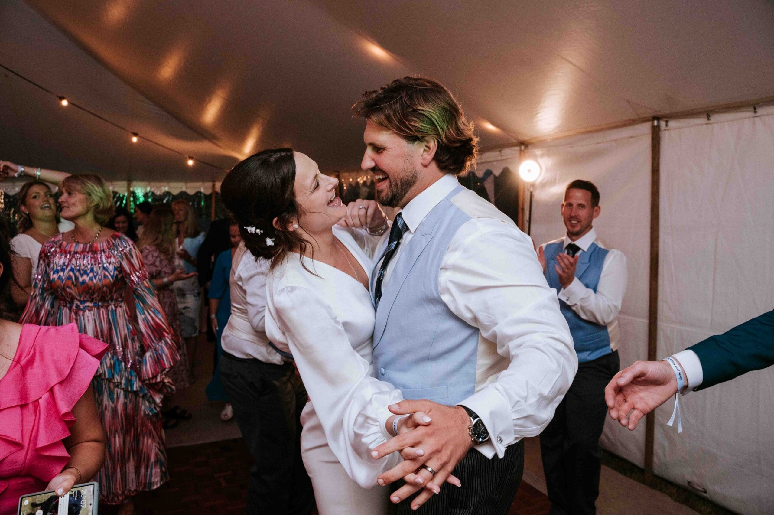 Just married couple enjoying a dance during their wedding reception